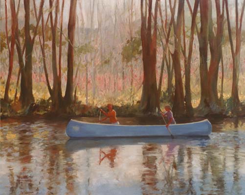 Blue canoe in wooded stream