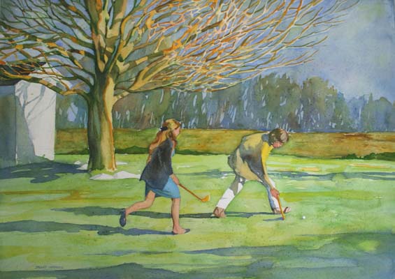 Two figures playing with ball in field