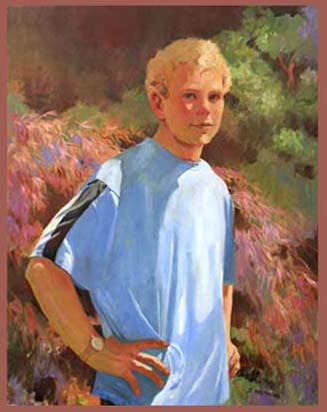 Young man in blue t-shirt with hand on hip